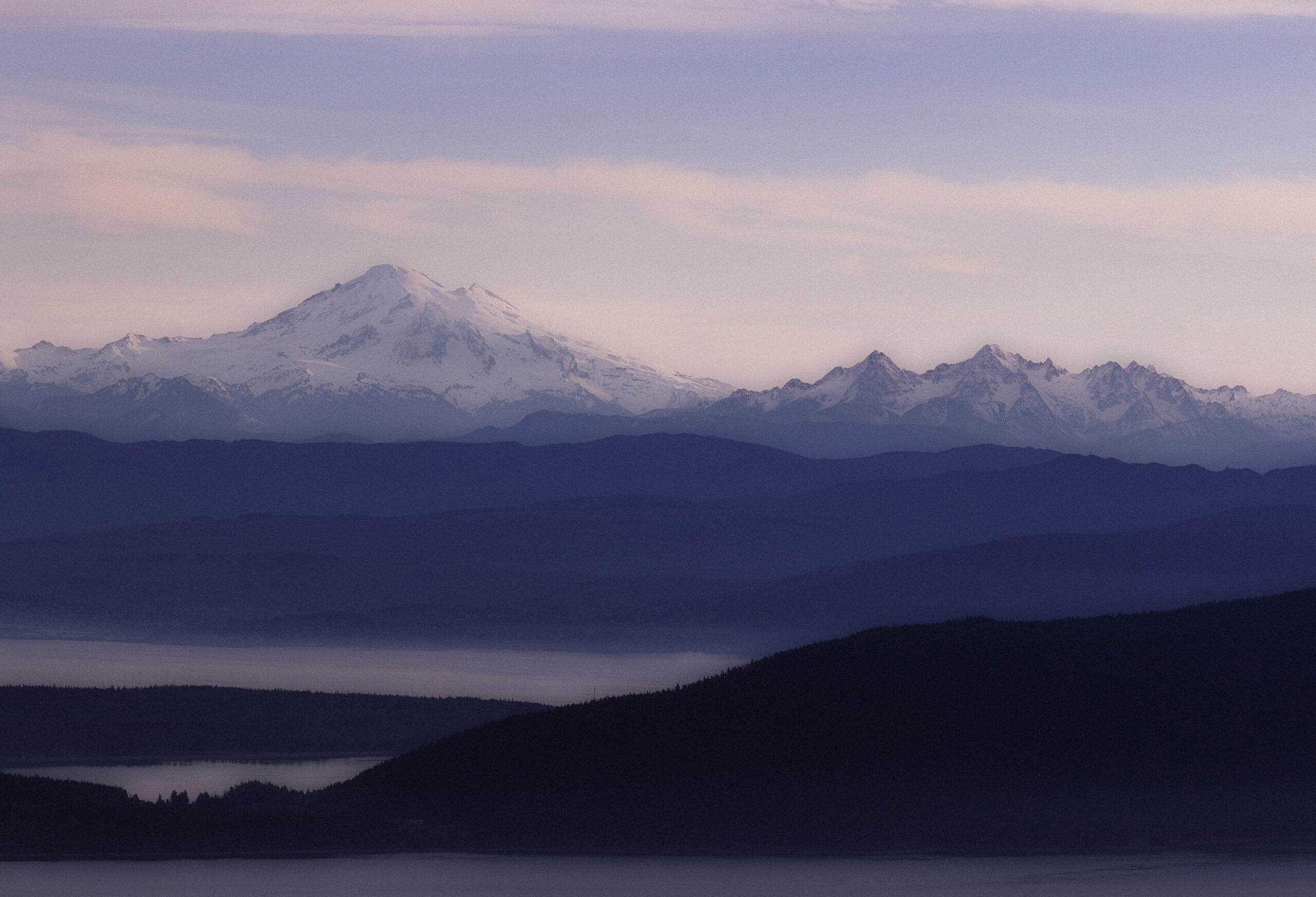 A landscape shot of a mountain at dawn