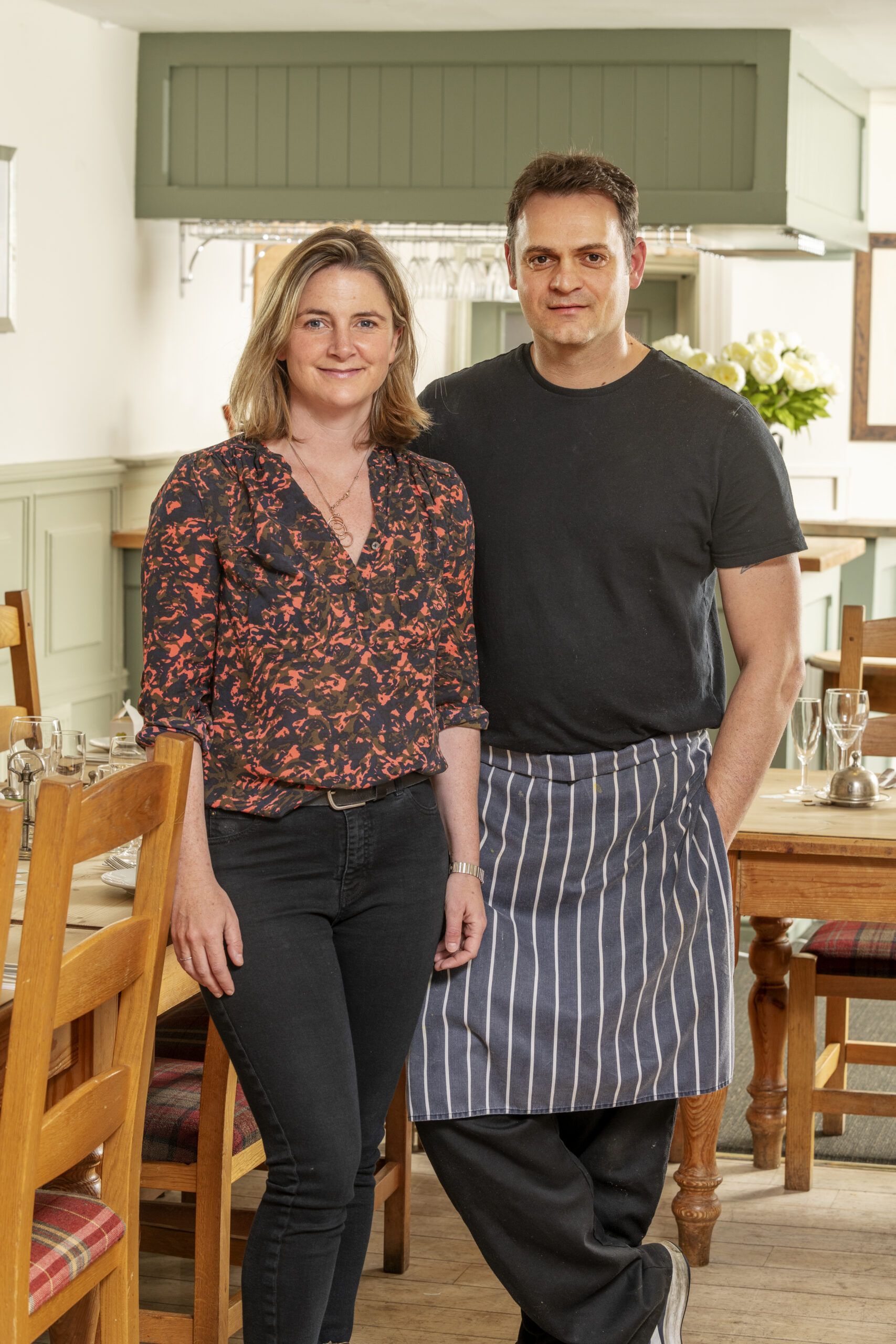 couple in dining area - toward camera