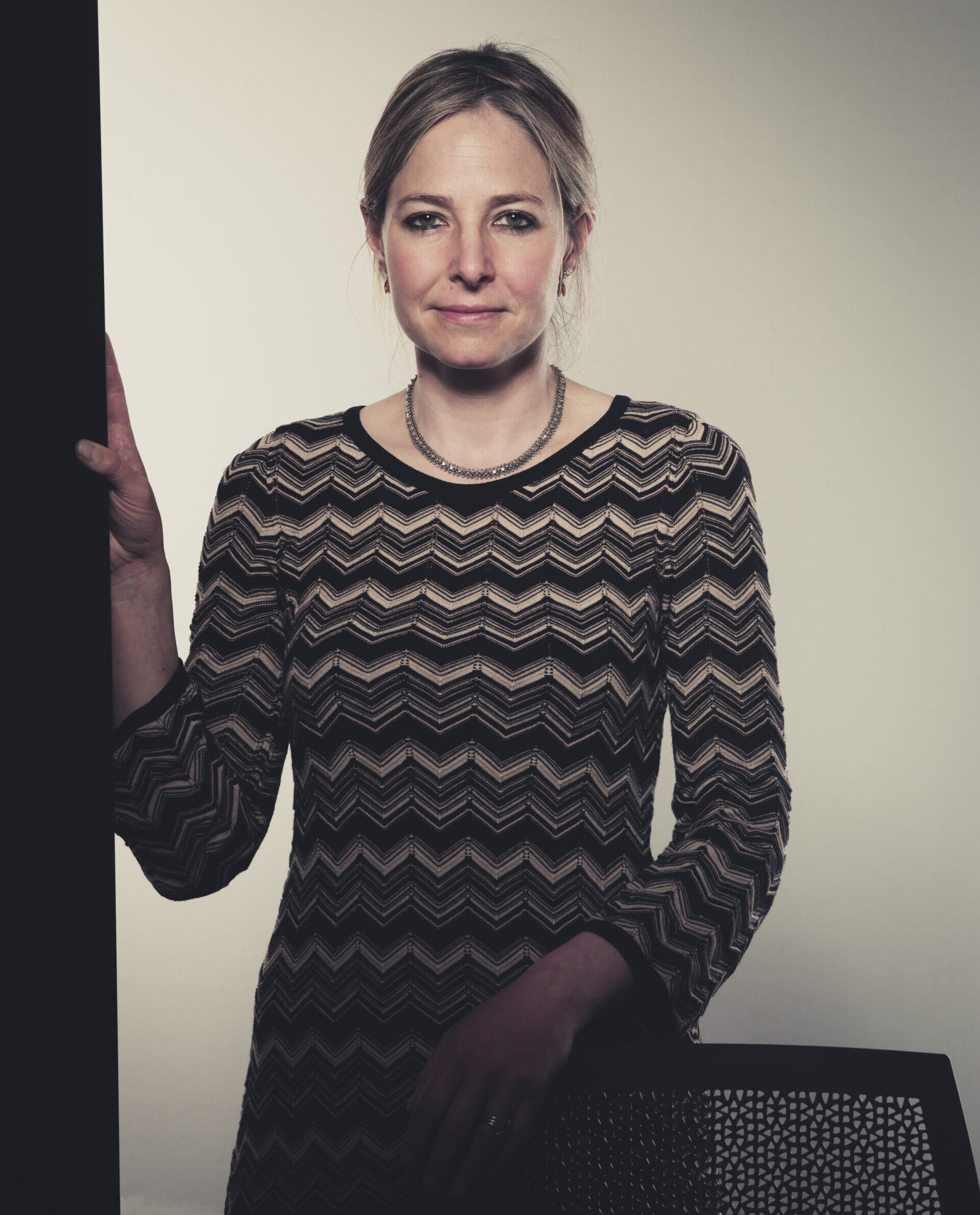 Alice Roberts - anthropologist - presenter in dress looking to camera